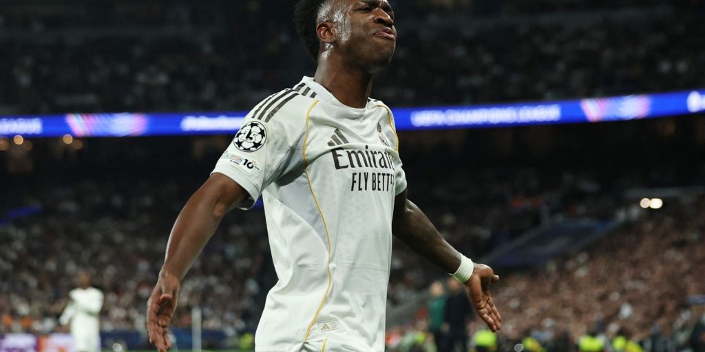 vini-jr-brilha-e-ajuda-real-a-despachar-benfica-na-liga-dos-campeoes
